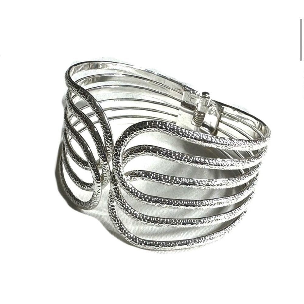 Silver tone textured hinged wide bracelet